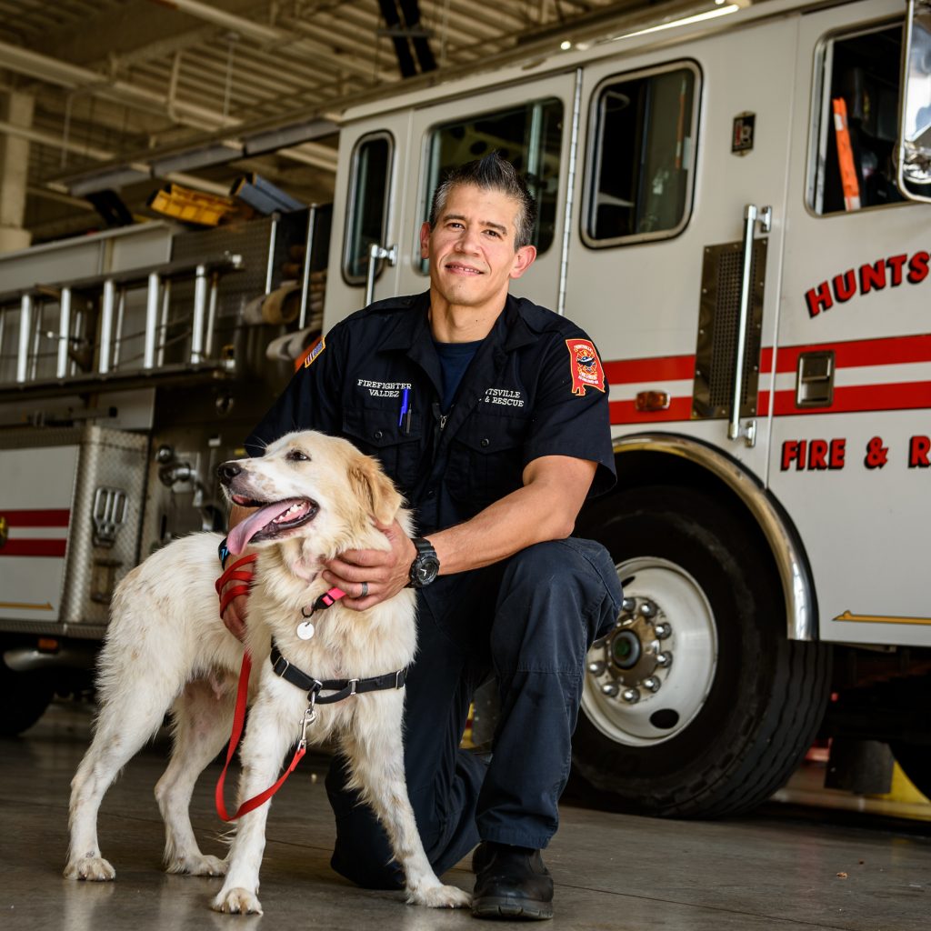 ADOPTED: Mosie, pictured here with Firefighter Jeff Valdez, has been adopted!