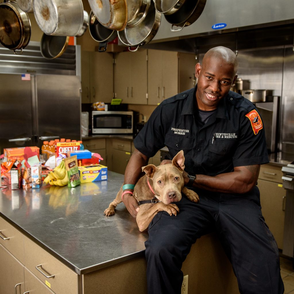 ADOPTED - Kate has since been adopted, but Firefighter Morris and Kate really bonded during this photoshoot. Just look at those snuggles!