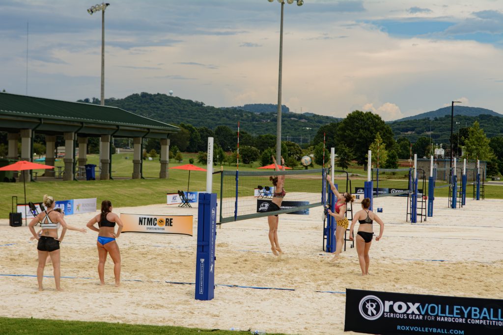 picture of women playing sand volleyball