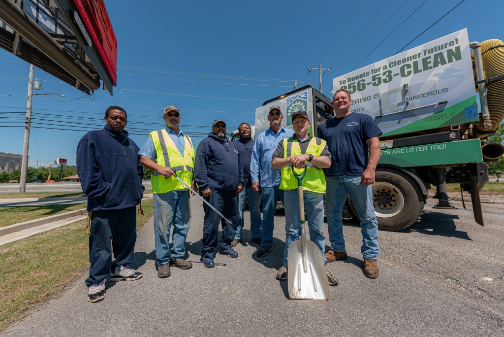 maintenance crews with their cleanup tools on South Parkway