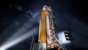 A photo or rendering of the SLS rocket on a launch pad