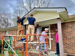 crews work rehabilitate home