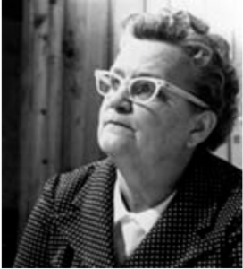 A portrait of Dr. Frances Roberts. She's an older lady and wearing glasses.