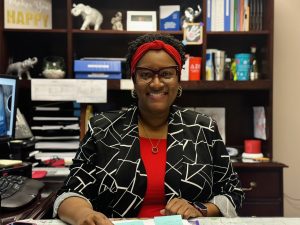 Jaurice Clay, an Employee Development and Training Specialist in the City's Human Resources Department, sits at her desk.