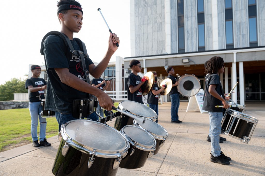 The Community Drumline performs outside City Hall during Huntsville Music Month in 2022.