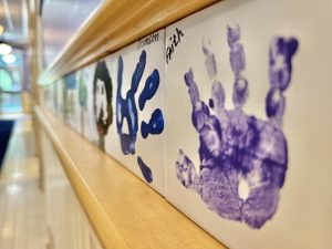 Photo of painted handprints on wall at the National Children's Advocacy Center